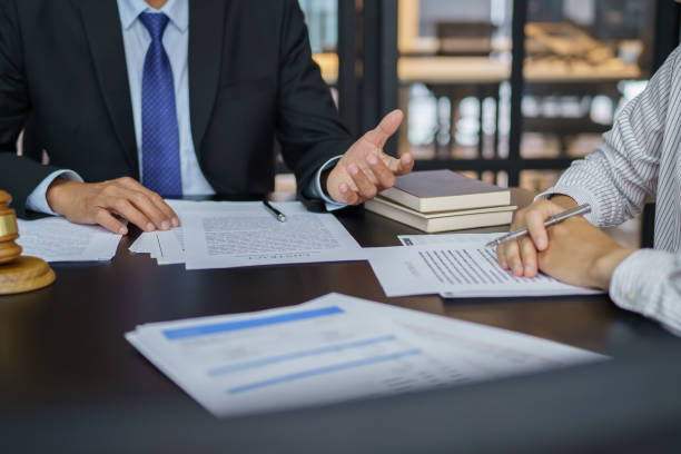 An advisor walking a client through documents